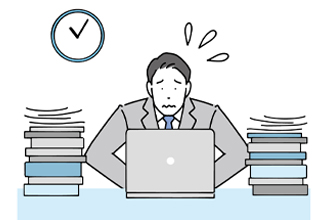 紙資料の管理に悩む男性