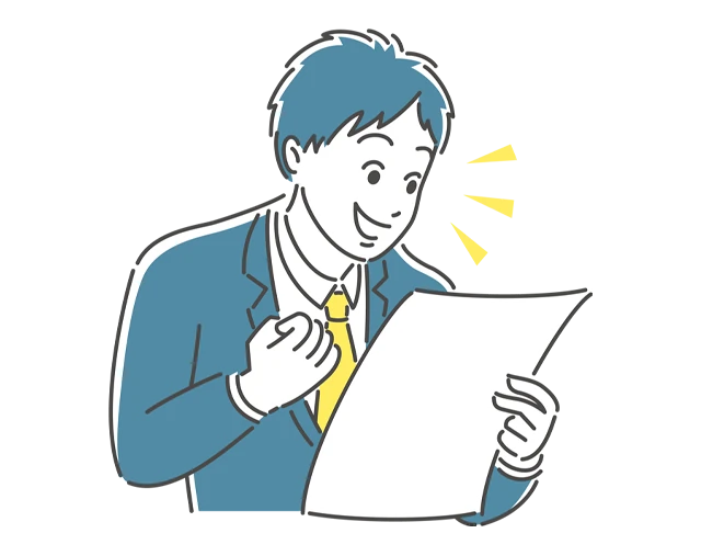 認定取得にガッツポーズをする男性社員